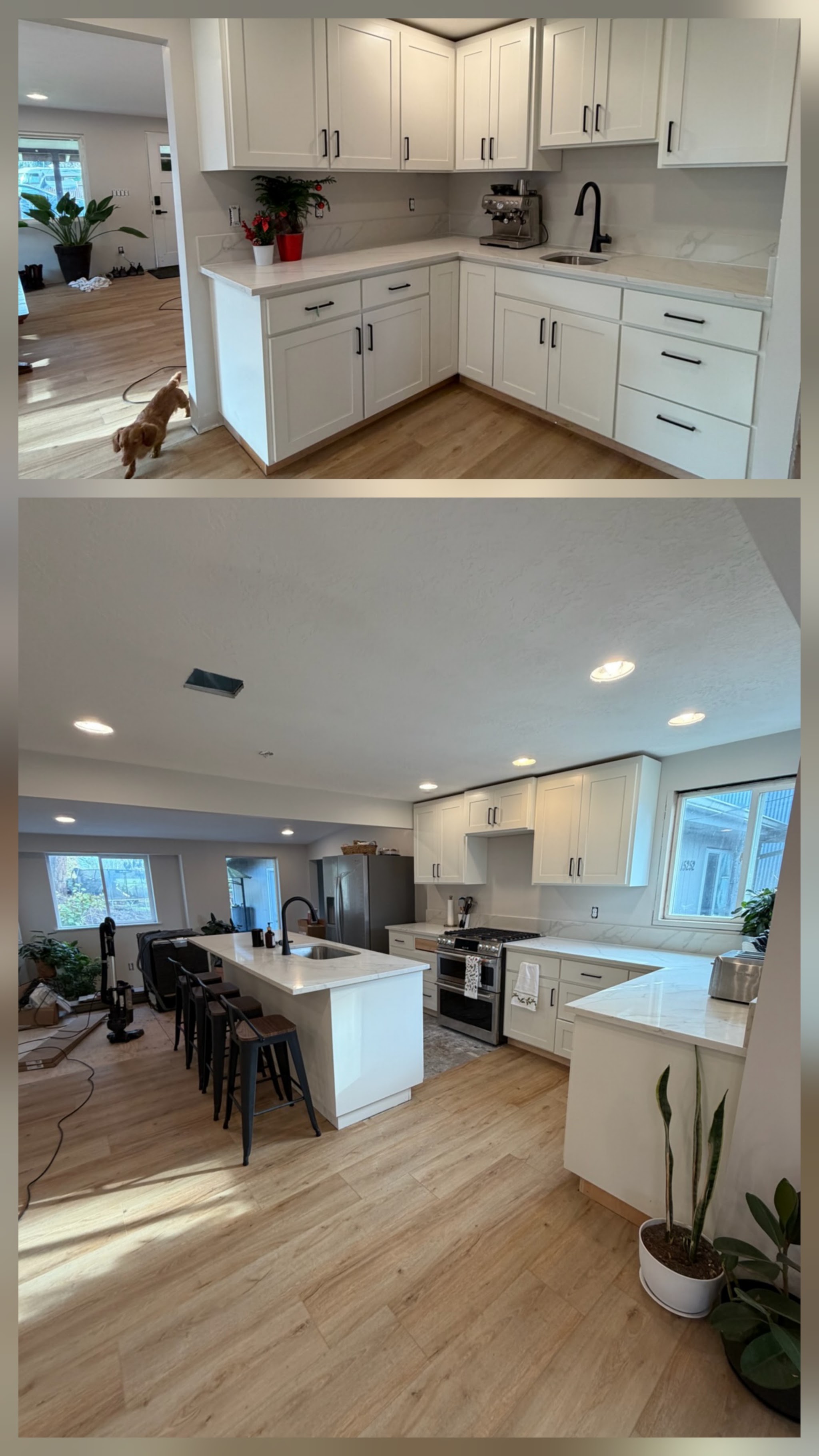 Finished kitchen remodel with white cabinets and a large island by Roth Construction